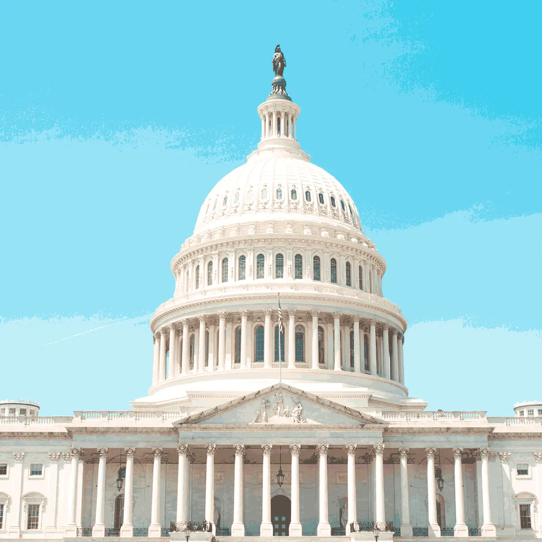 The white domed roof of the US Senate building against a blue sky